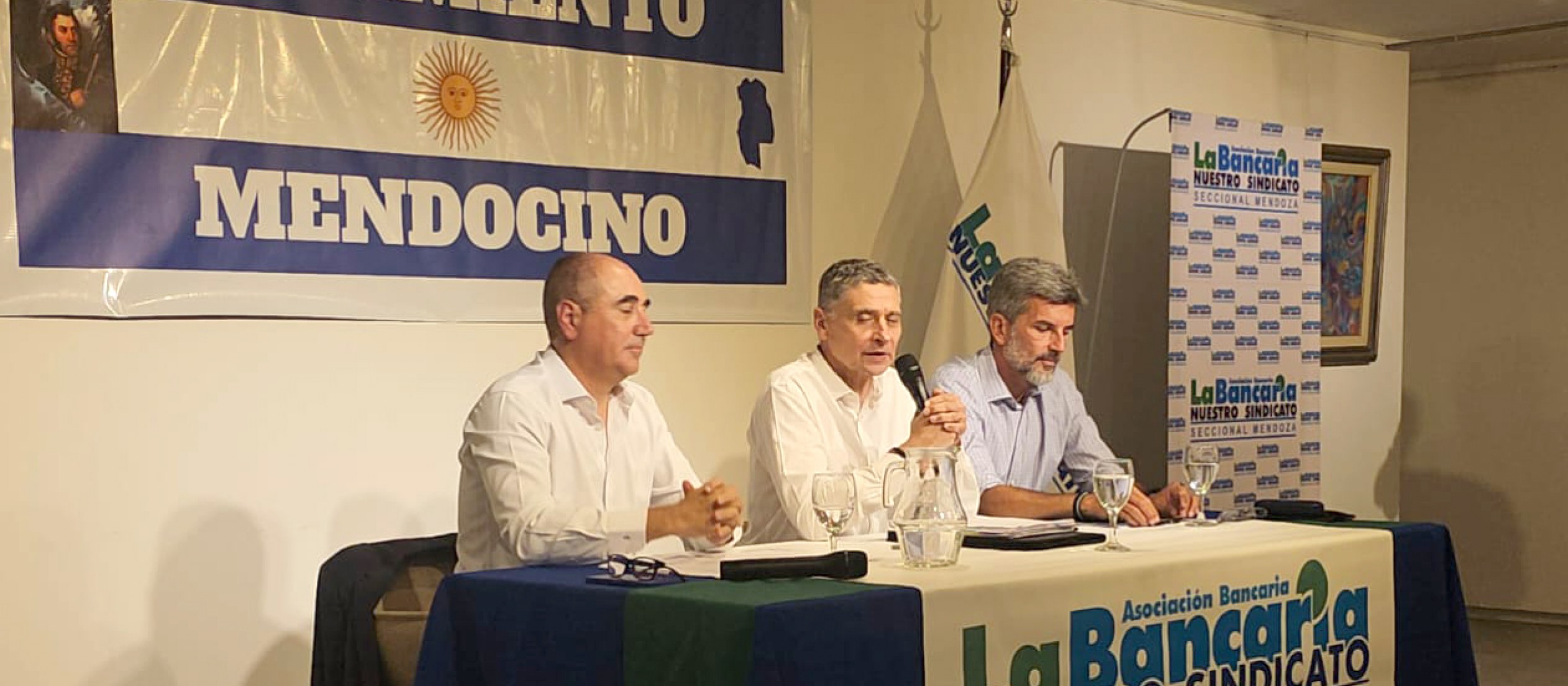 Un empresario, un sindicalista y un intendente, reunidos por la reforma laboral